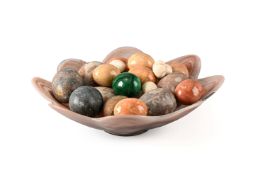 A DECORATIVE ART GLASS LOBED BOWL CONTAINING A COLLECTION OF DECORATIVE TURNED EGGS EG