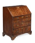 A GEORGE I WALNUT BUREAU, CIRCA 1720