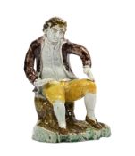 A STAFFORDSHIRE PEARLWARE FIGURE OF CHARLES JAMES FOX (1749-1806), CIRCA 1800