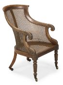 A WILLIAM IV MAHOGANY BERGÈRE ARMCHAIR, CIRCA 1835