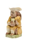 A STAFFORDSHIRE CREAMWARE TOBY JUG, LATE 18TH CENTURY