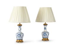 A PAIR OF FRENCH GILT MOUNTED BLUE AND WHITE PORCELAIN VASE TABLE LIGHTS, LATE 19TH CENTURY