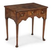 A GEORGE I WALNUT AND FEATHERBANDED SIDE TABLE OR LOWBOY, CIRCA 1720