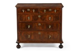 A WILLIAM & MARY WALNUT AND FEATHERBANDED CHEST OF DRAWERS, CIRCA 1690