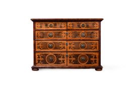 A CHARLES II OLIVEWOOD OYSTER, WALNUT, LABURNUM AND HOLLY INLAID CHEST OF DRAWERS, CIRCA 1680