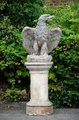 A COMPOSITION STONE EAGLE, IN THE MANNER OF AUSTIN & SEELEY, LATE 20TH CENTURY