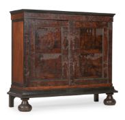 Y A CONTINENTAL CEDAR AND EBONY CUPBOARD, PROBABLY DUTCH, 18TH CENTURY