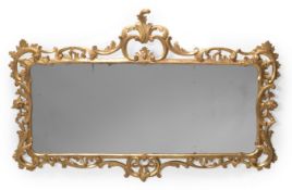 A GEORGE III CARVED GILTWOOD MIRROR, CIRCA 1770