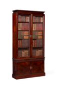 A GEORGE II CARVED MAHOGANY BOOKCASE OR 'CHINA CABINET', CIRCA 1740-50