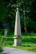 A LARGE CARVED STONE OBELISK, CONTEMPORARY