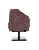 A LARGE SECTION OF PART POLISHED EGYPTIAN PORPHYRY