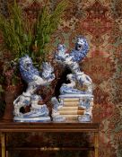 A PAIR OF GALLE NANCY (ST. CLÉMENT FAÏENCERIE) BLUE AND WHITE MODELS OF HERALDIC LIONS, LATE 19TH CE