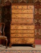 A GEORGE II WALNUT, BURR WALNUT AND FEATHERBANDED SECRETAIRE CHEST ON CHEST, CIRCA 1740