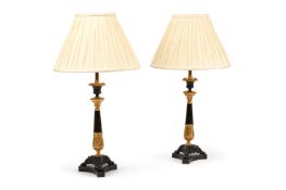 A PAIR OF BRONZE AND GILT CANDLESTICK TABLE LIGHTS, CIRCA 1830