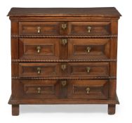 A CHARLES II WALNUT AND ELM CHEST OF DRAWERS, CIRCA 1670