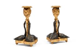 A PAIR OF GILT AND PATINATED BRONZE SWAN CANDLESTICKS, CIRCA 1840
