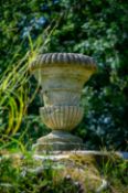A LARGE CARVED COTSWOLD STONE CAMPANA URN PLANTER, MID 19TH CENTURY