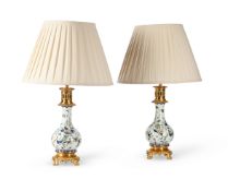 A PAIR OF GILT METAL MOUNTED FLORAL PATTERNED POTTERY TABLE LIGHTS, LATE 19TH CENTURY