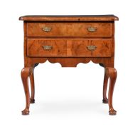 A GEORGE II WALNUT AND FEATHERBANDED SIDE TABLE OR LOWBOY, CIRCA 1740