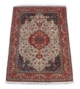 A SILK KASHAN RUG