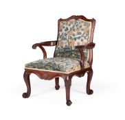 A GEORGE II 'RED WALNUT' AND NEEDLEWORK UPHOLSTERED ARMCHAIR, CIRCA 1750