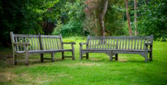 A LARGE NEAR PAIR OF TEAK GARDEN BENCHES, CONTEMPORARY