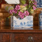 AN ENGLISH DELFT CHINOISERIE BLUE AND WHITE FLOWER BRICK, CIRCA 1760