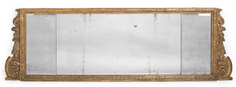 A GEORGE II CARVED GILTWOOD AND GESSO TRIPTYCH OVERMANTEL MIRROR, CIRCA 1730