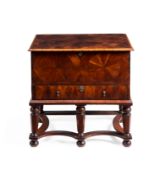 Y A QUEEN ANNE ROSEWOOD OYSTER, KINGWOOD AND FRUITWOOD COFFER OR MULE CHEST ON STAND, CIRCA 1710