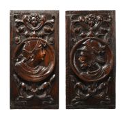 A PAIR OF CARVED OAK 'ROMAYNE' PANELS, 16TH CENTURY
