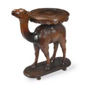 AN ANGLO INDIAN CARVED INDIAN TEAK TABLE MODELLED AS A CAMEL, LATE 19TH OR EARLY 20TH CENTURY