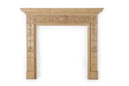 A CARVED PINE CHIMNEY PIECE OR FIRE SURROUND, LATE 18TH OR EARLY 19TH CENTURY AND LATER