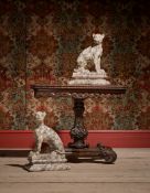 A PAIR OF CARVED ALABASTER DOGS OR PANTHERS, LATE 19TH OR EARLY 20TH CENTURY