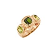 A PERIDOT AND TOURMALINE DRESS RING