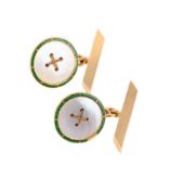 Y A PAIR OF MOTHER OF PEARL AND GREEN ENAMEL CUFFLINKS