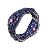 A SAPPHIRE, PINK SAPPHIRE AND ROSE CUT DIAMOND BANGLE