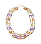 A POLISHED QUARTZ BEAD NECKLACE