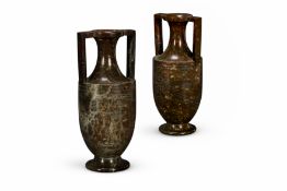AFTER THE ANTIQUE, A PAIR OF TURNED AND POLISHED CORNISH SERPENTINE URNS