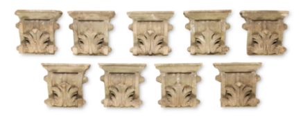 A SET OF NINE COMPOSITION STONE CORBELS, LATE 19TH CENTURY
