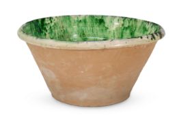 A LARGE GREEN GLAZED TERRACOTTA SERVING BOWL , FRENCH OR ITALIAN, 19TH CENTURY