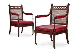 A PAIR OF GEORGE III GOTHIC MAHOGANY AND CANED LIBRARY ARMCHAIRS, CIRCA 1790, ATTRIBUTED TO GILLOWS