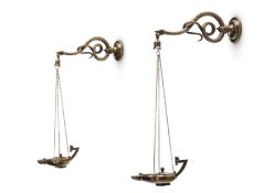 A PAIR OF REGENCY GILT LACQUERED BRONZE SATYR OIL LAMPS AND SERPENT BRACKETS