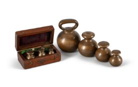 A GROUP OF BRASS AVOIRDUPOIS SPHERICAL WEIGHTS