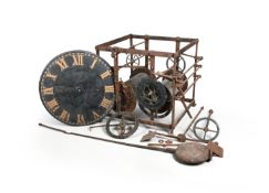 AN ENGLISH WROUGHT IRON AND BRASS TURRET CLOCK MOVEMENT
