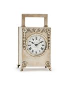 AN EDWARDIAN SILVER CASED CARRIAGE CLOCK