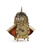 A FINE CHARLES I/JAMES II MINIATURE BRASS LANTERN CLOCK WITH CENTRE-SWINGING PENDULUM