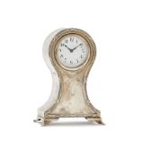 AN EDWARDIAN SMALL SILVER BALLOON-SHAPED DESK TIMEPIECE