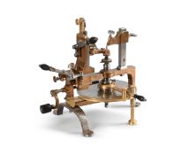 A SWISS BRASS AND STEEL WHEEL CUTTING ENGINE