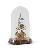 A BRASS ‘GREAT WHEEL’ SKELETON CALENDAR TIMEPIECE WITH MOONPHASE