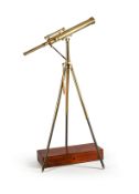 A LACQUERED BRASS PORTABLE FLOOR-STANDING 2.75 INCH REFRACTING TELESCOPE